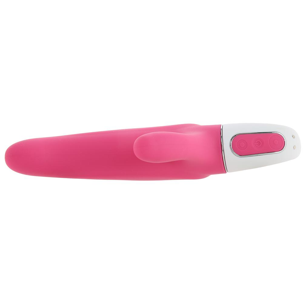 Pink silicone vibrator with white control panel and two circular buttons.