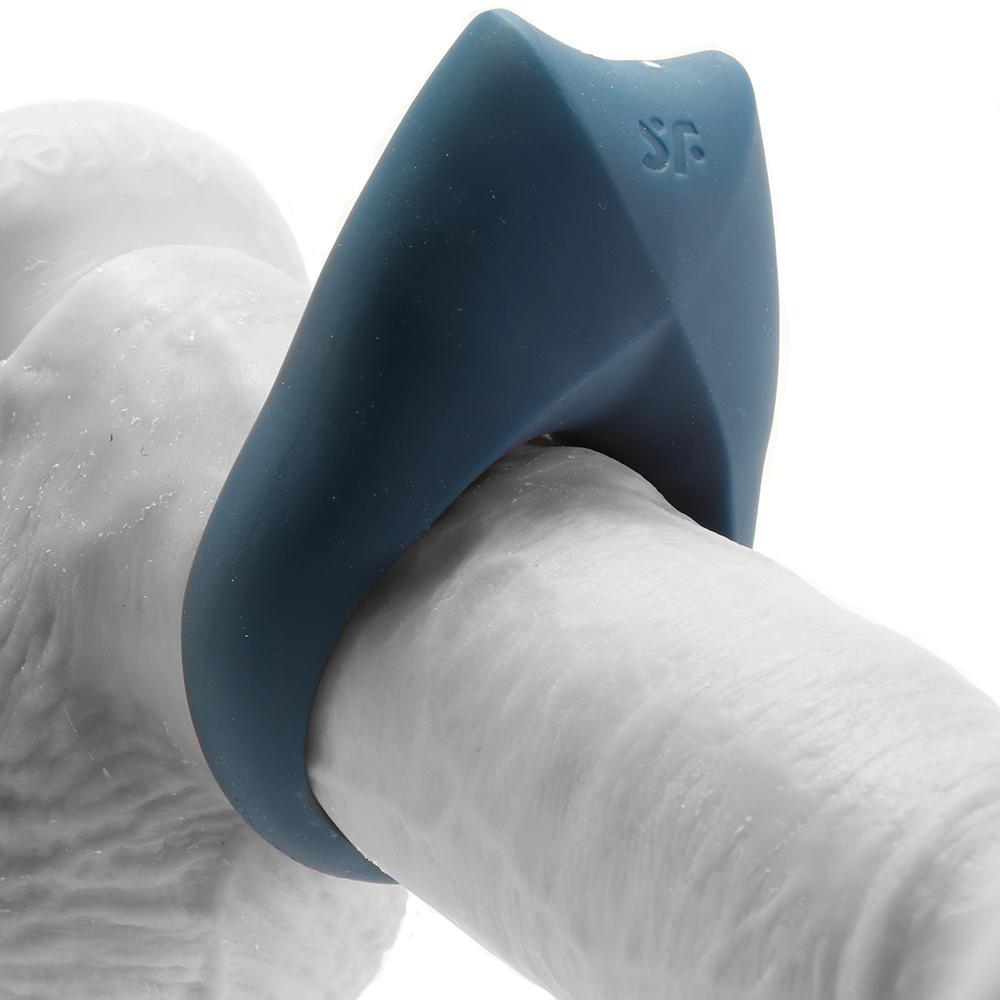 Blue vibrating cock ring with clitoral stimulator.