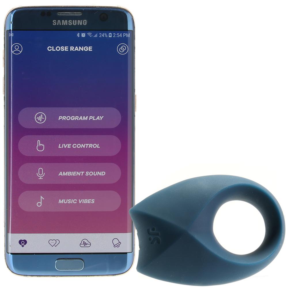 A blue vibrating cock ring and a smartphone displaying the Satisfyer Connect app.