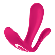 Pink wearable vibrator with dual motors and a curved design.
