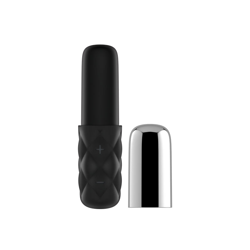 Black silicone vibrator with textured grip and silver cap.