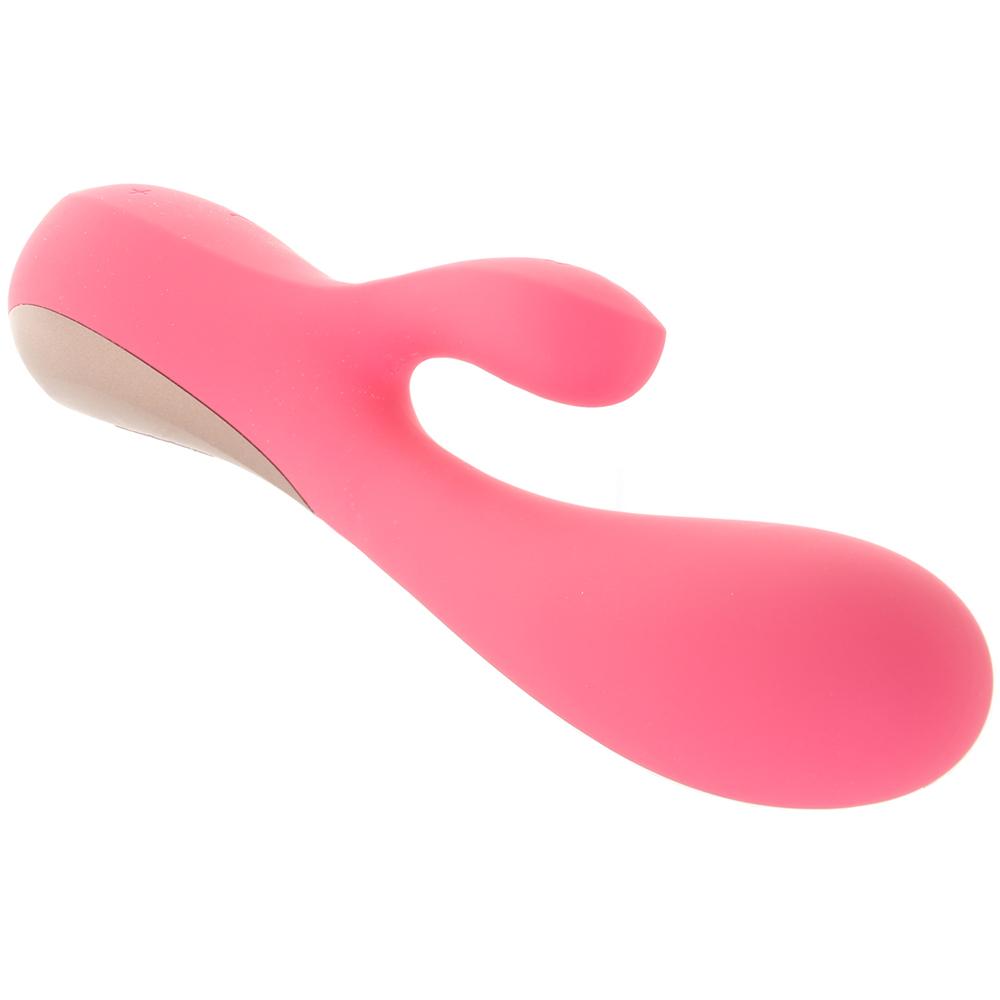 A pink, flexible rabbit vibrator with a curved shape and a beige accent.