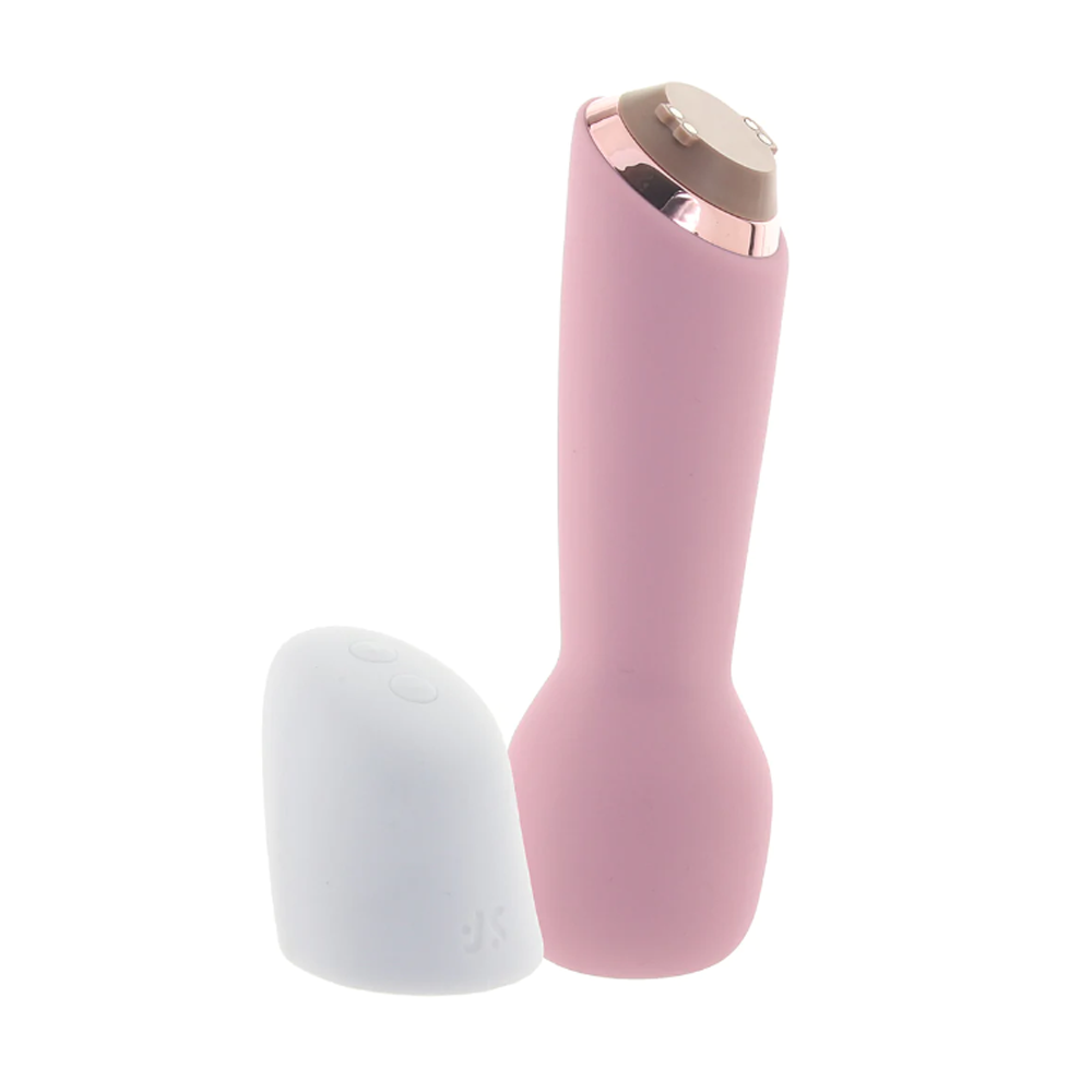 A pink vibrator with a white cap and rose gold accents.