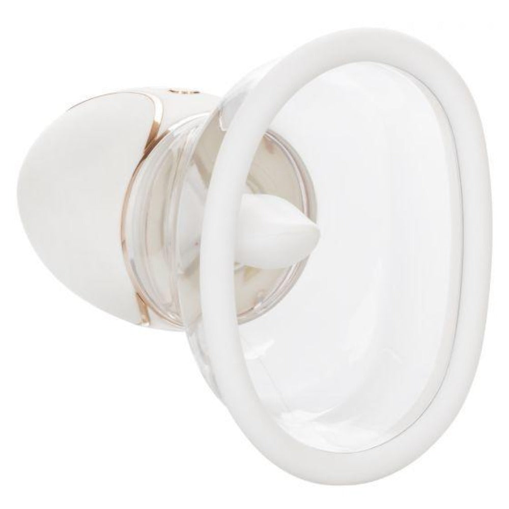 White and rose gold vibrator with a clear suction cup.