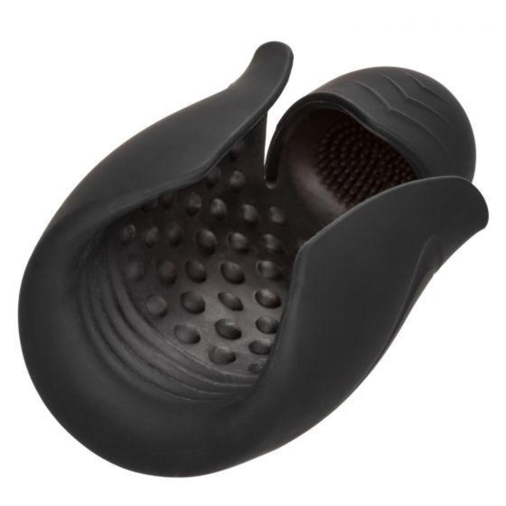 Black vibrating masturbator with textured interior and flexible opening.