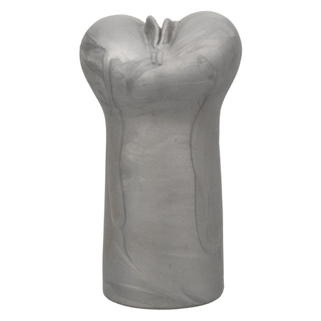 A silver, heart-shaped suction masturbator with a textured opening.