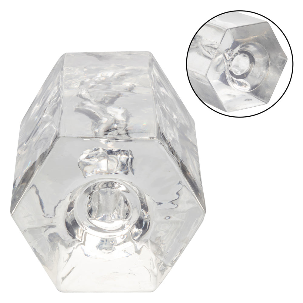 Clear hexagonal crystal masturbator with a textured interior.