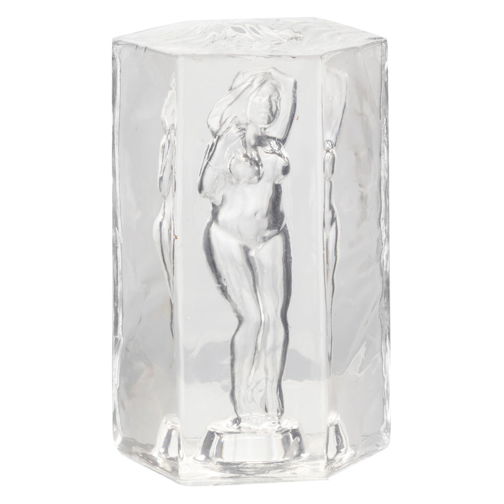 Transparent octagonal suction stroker with etched female figures.