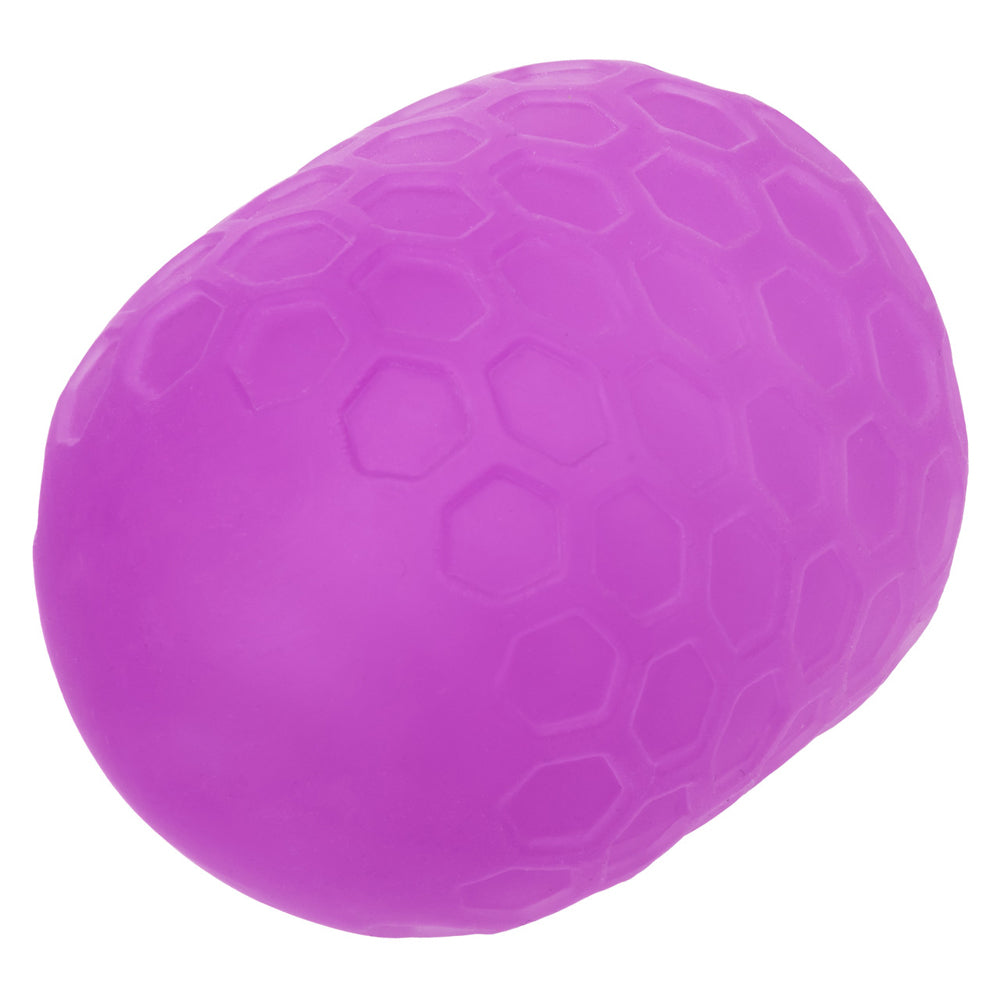 Purple textured stroker with hexagonal pattern.