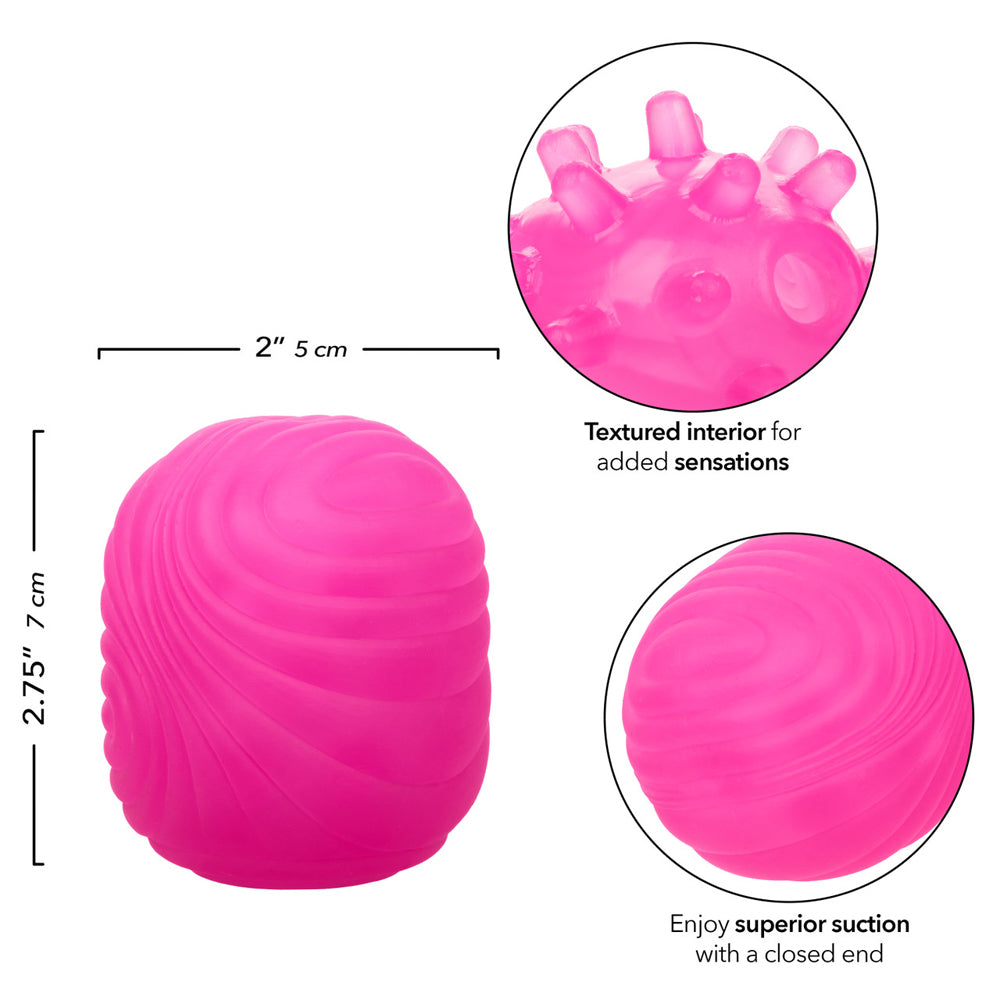 Pink textured stroker with internal bumps and a closed end for suction.