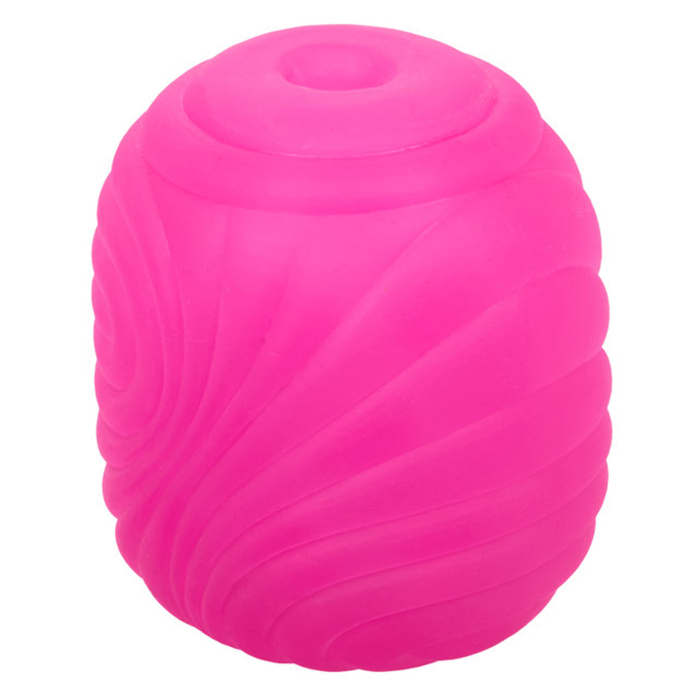 Pink textured reversible stroker with a suction opening.