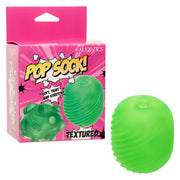 Green textured reversible stroker with suction.