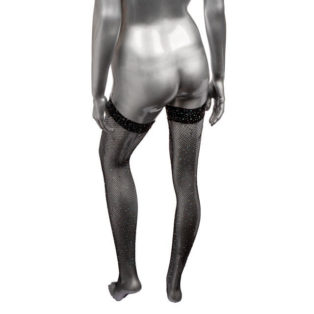 Black fishnet thigh-high stockings with rhinestones.