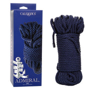 A dark blue Calexotics Admiral rope coiled next to its packaging.