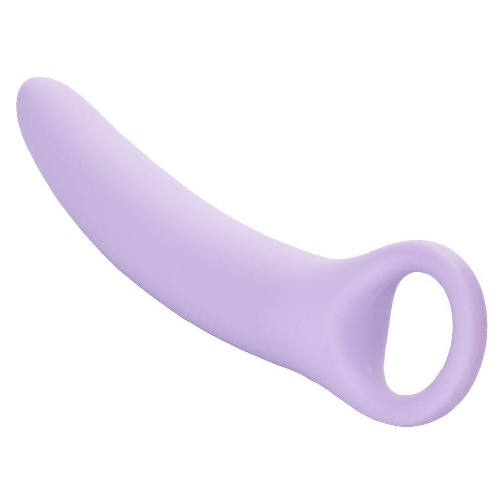 A purple curved silicone vaginal dilator with a finger loop.