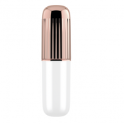 White and rose gold clitoral vibrator resembling a lipstick.