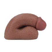 A 5-inch soft packing penis made from Pure Skin material, shown in a curved position.