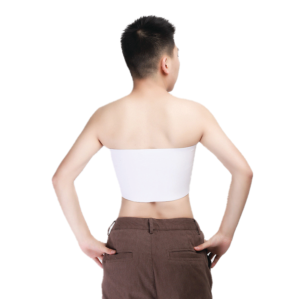 Strapless white chest compression binder with brown pants.