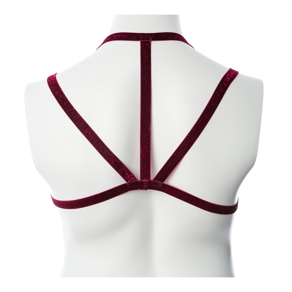 Burgundy glittery chest harness on a white mannequin.