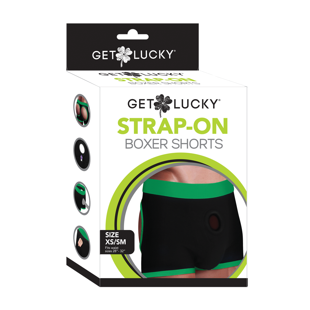 Black boxer shorts with green trim and a silicone O-ring.