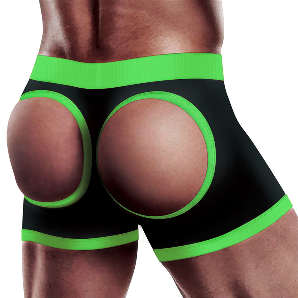 Black boxer shorts with green trim and circular cutouts on the back.