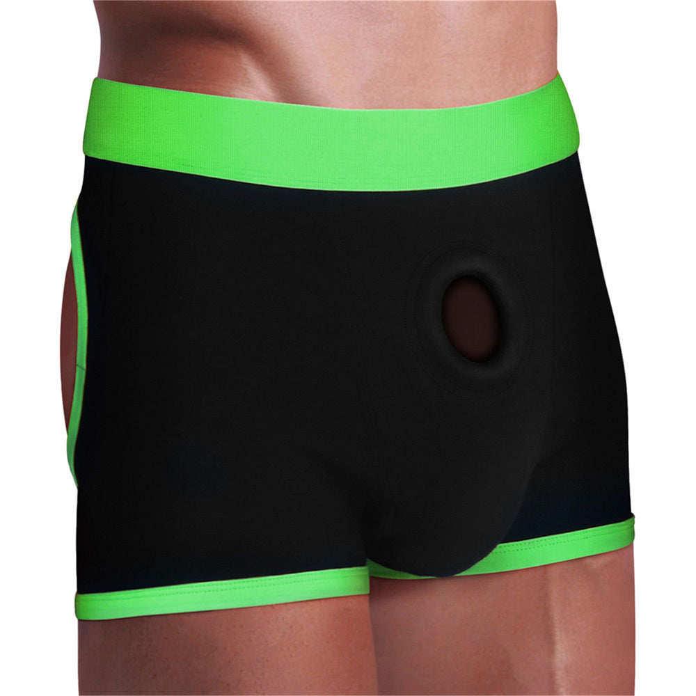 Black boxer shorts with neon green trim and a circular opening.