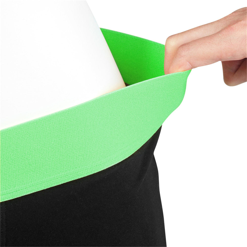 Black boxer shorts with a bright green elastic waistband and a white insert.