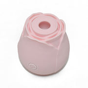 Pink rose-shaped vibrator with a subtle lip imprint.