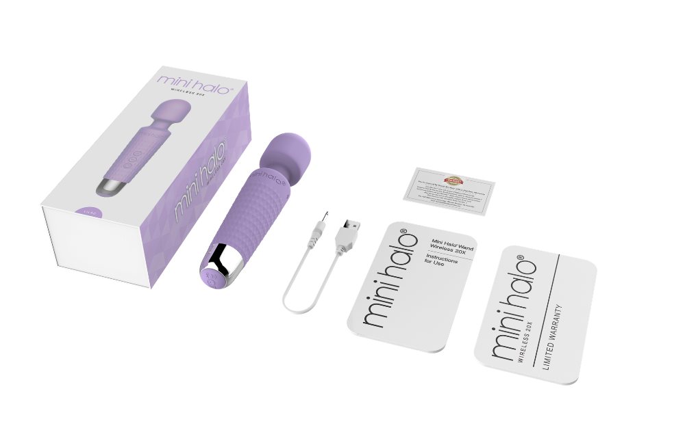 A lilac Mini Halo wand massager with its box, charging cable, and instructions.