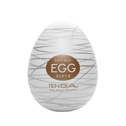 Tenga Silky II egg-shaped male masturbator with a white textured exterior.