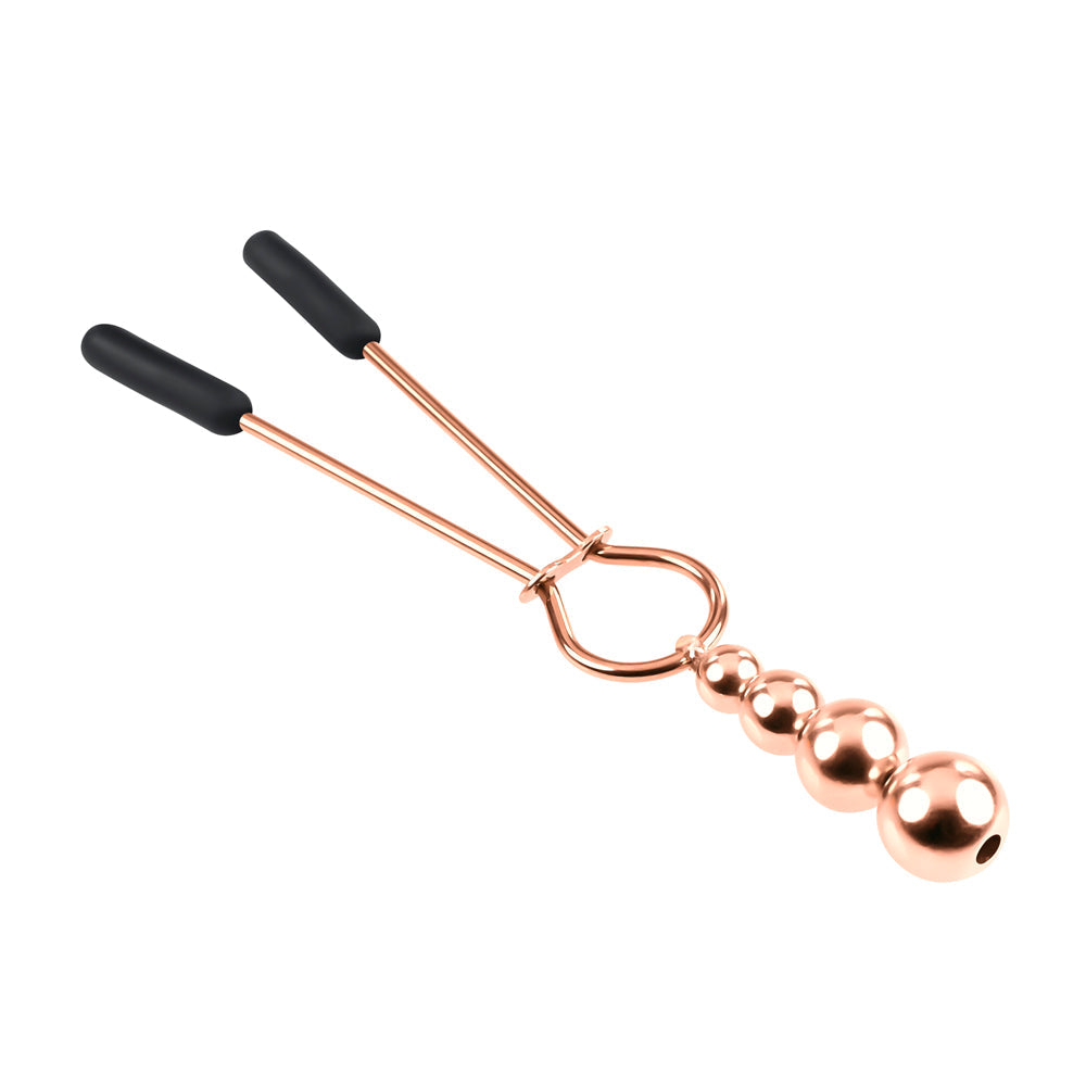 Rose gold nipple clamps with adjustable rubber tips and hanging beads.