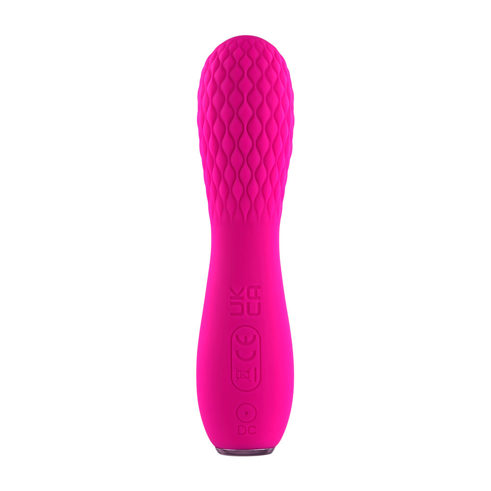 A pink quilted silicone vibrator with CE and UKCA markings.