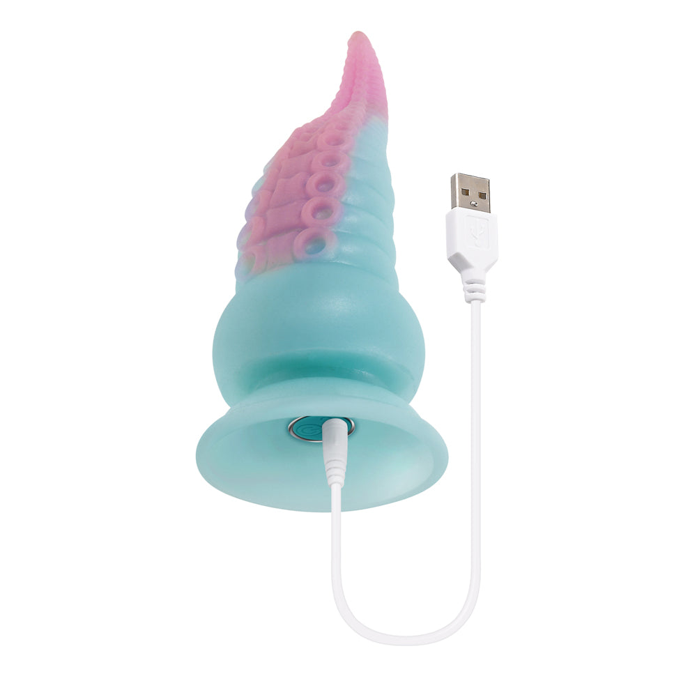 A blue and pink silicone tentacle vibrator with a USB charging cable.