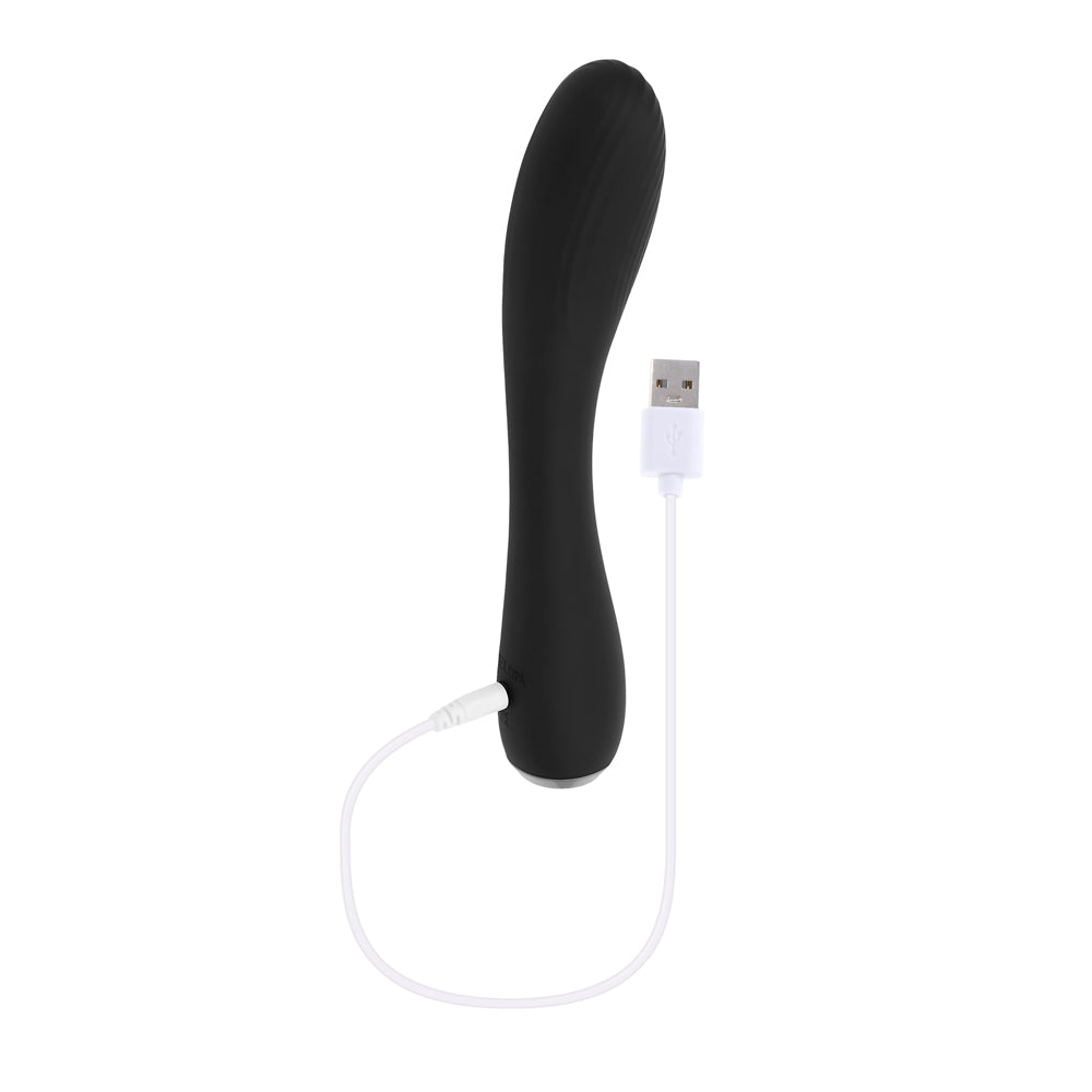 Black curved silicone vibrator with USB charging cable.