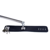 Adjustable steel spreader bar with black leather cuffs and lock.