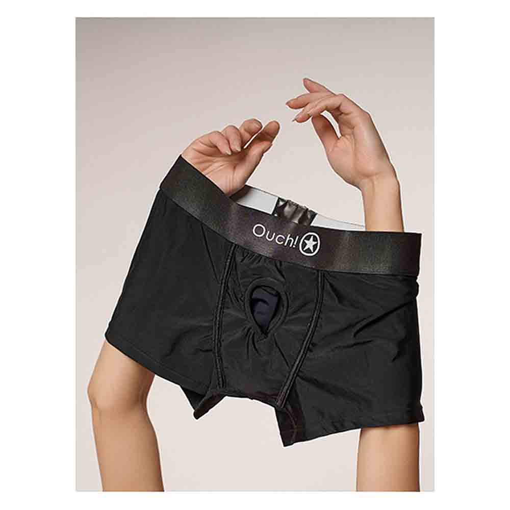Black boxer briefs with a hole in the front and "Ouch!" printed on the waistband.