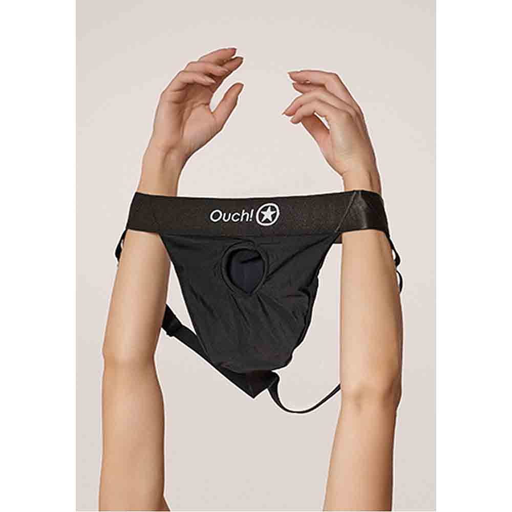 Black vibrating strap-on panty harness with Ouch! logo.