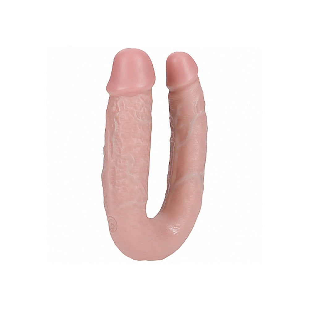 Realistic U-shaped double dildo with veined texture in soft pink silicone.