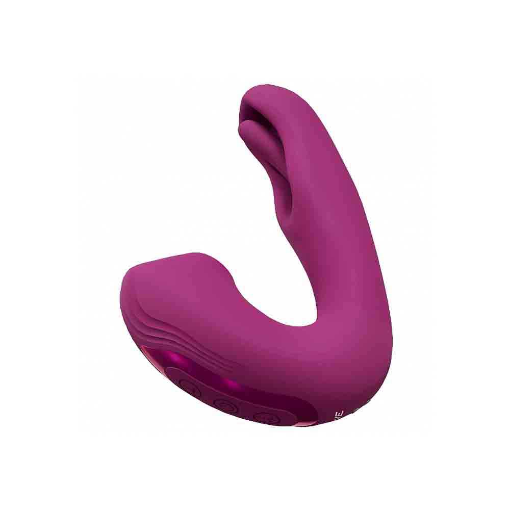A purple dual action vibrator with a curved shape and buttons on the base.