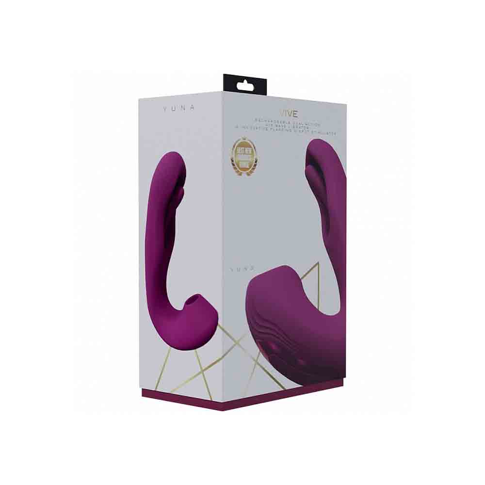 A purple dual action flapping and suction vibrator on a white box.