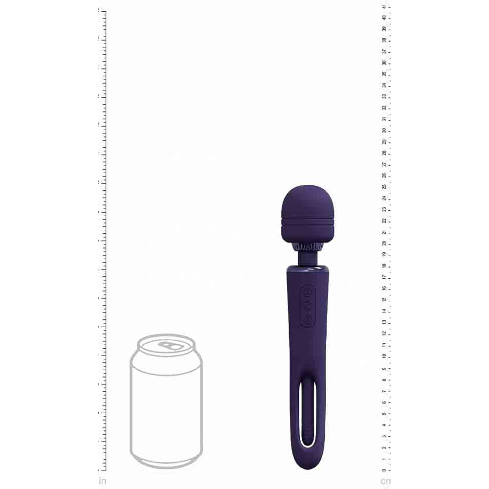 A purple wand vibrator with a rounded head and a handle with buttons, shown next to a soda can and a ruler.