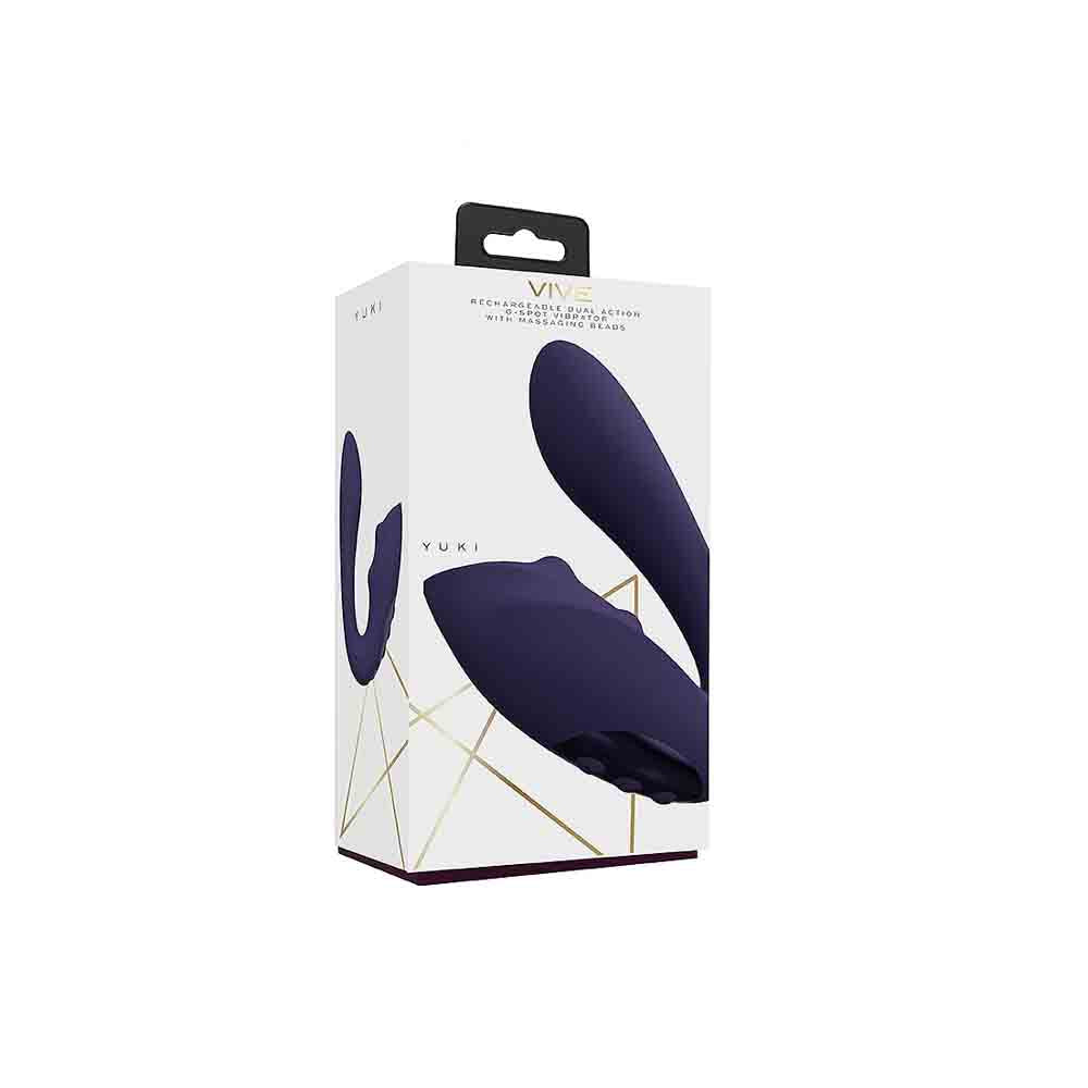 A purple dual G-spot vibrator with moving beads on a white box.