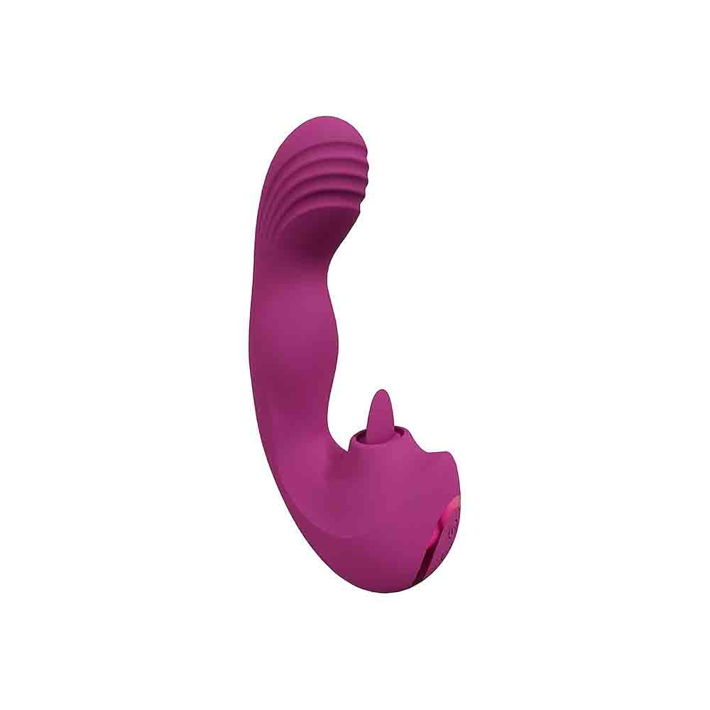 A purple silicone vibrator with a curved shape and ribbed top.