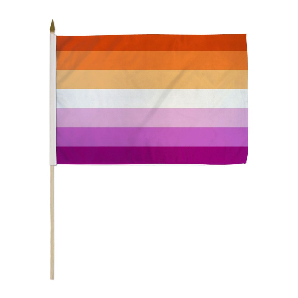 A Lesbian Sunset stick flag with orange, white, and pink stripes on a wooden stick.