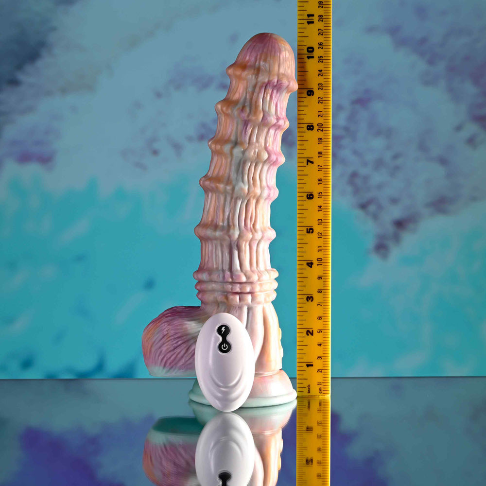 A girthy fantasy dildo with a textured shaft and a remote control.