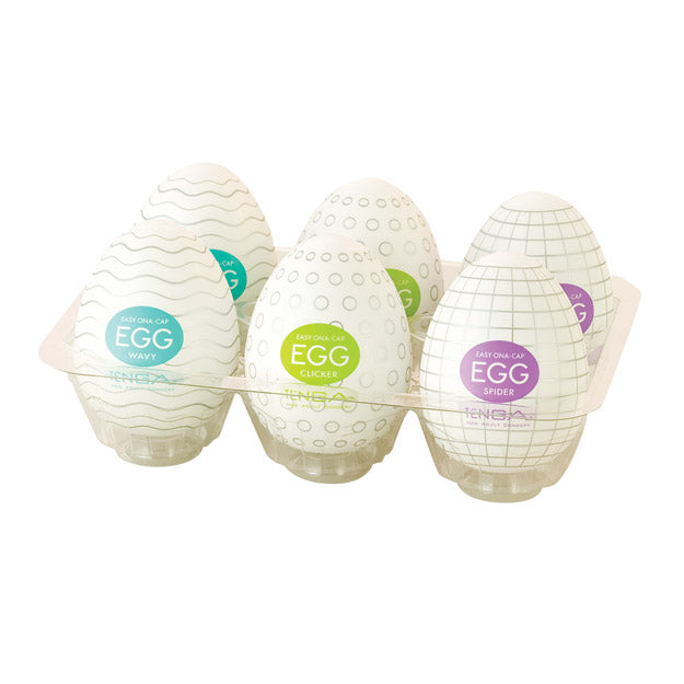 A six-pack of Tenga Egg disposable male masturbators with different textures.
