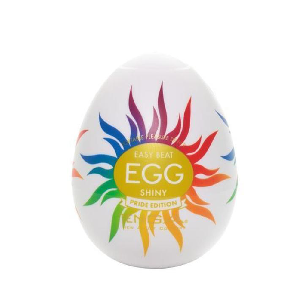 A white Tenga egg-shaped masturbator with a rainbow sun design.