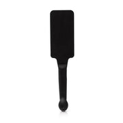 Black silicone paddle with a rounded handle.