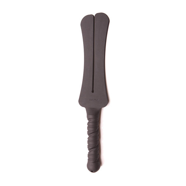A dark gray silicone spanking paddle with a split head and a textured handle.