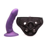 Purple silicone Curve dildo with black leather strap-on harness kit.